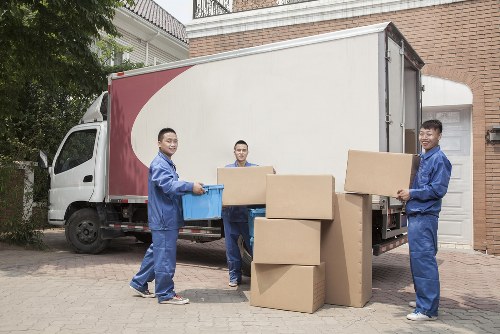 Professional removal team loading boxes for a Knightsbridge move