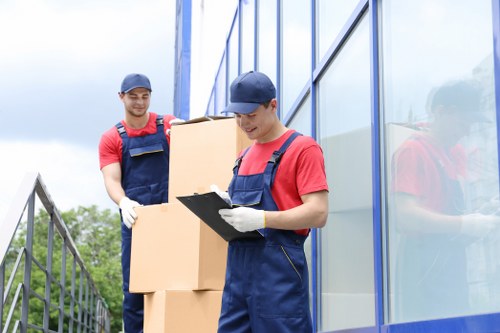 Man and van team preparing a safe move with protective equipment