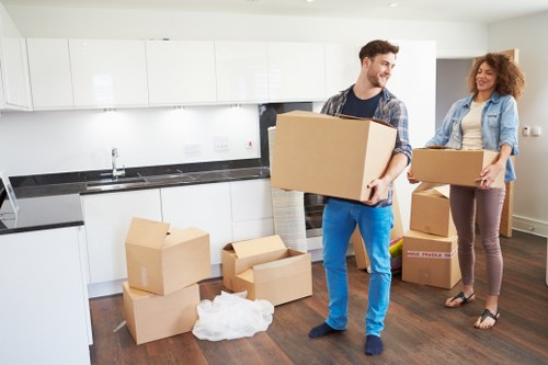 Local moving team handling boxes and household items in Knightsbridge