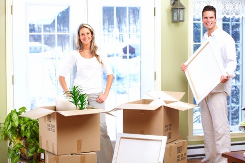 Local movers handling furniture and boxes for a Knightsbridge property move