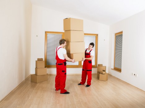 Staff using PPE during a professional house move